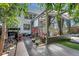 Charming backyard and outdoor patio with a screen room, exterior of home and garden at 1135 Florida Ave, Sarasota, FL 34236