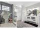 Modern bathroom featuring glass shower, creative tiling and a double sink vanity at 1135 Florida Ave, Sarasota, FL 34236