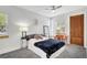 Bright bedroom with white walls, a ceiling fan, and a view of the outside at 1135 Florida Ave, Sarasota, FL 34236