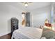 Comfortable bedroom with hardwood floors and dark wood furniture at 1135 Florida Ave, Sarasota, FL 34236