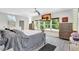 Spacious bedroom showcasing large windows, a ceiling fan, and neutral decor at 1135 Florida Ave, Sarasota, FL 34236
