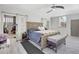 Comfortable bedroom featuring a king bed, sliding doors, and ample natural light at 1135 Florida Ave, Sarasota, FL 34236