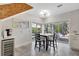 Kitchen dining area with backyard view and bright light fixture at 1135 Florida Ave, Sarasota, FL 34236