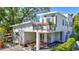 Stylish two-story modern home with a balcony and well-maintained landscaping at 1135 Florida Ave, Sarasota, FL 34236