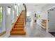 Bright open-concept interior highlighting modern stairs and a well-equipped kitchen at 1135 Florida Ave, Sarasota, FL 34236