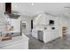 Clean white kitchen with modern appliances, subway tile backsplash, and sink at 1135 Florida Ave, Sarasota, FL 34236
