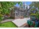 Enclosed patio with outdoor furniture, ceiling fan, stone pavers, and an attached home at 1135 Florida Ave, Sarasota, FL 34236