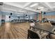 Large event space with tables, chairs, and A/V equipment for various activities at 1218 Spoonbill Landings Cir, Bradenton, FL 34209