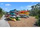 Rows of colorful kayaks are neatly stacked on a rack, offering a great opportunity for water adventures at 1218 Spoonbill Landings Cir, Bradenton, FL 34209