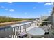 Relax on this inviting patio with comfortable seating and scenic water views at 1218 Spoonbill Landings Cir, Bradenton, FL 34209