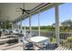 Spacious covered patio with ample seating, ideal for outdoor dining and entertaining with scenic views at 1218 Spoonbill Landings Cir, Bradenton, FL 34209