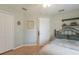 Comfortable bedroom with wood flooring, closet, and traditional decor at 1269 Rasp Ct, North Port, FL 34288