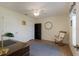 Bedroom featuring ceiling fan, wood floor, and comfortable rocking chair at 1269 Rasp Ct, North Port, FL 34288