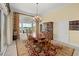 Dining room boasts a decorative hutch and a colorful area rug at 1364 Point Crisp Rd, Sarasota, FL 34242