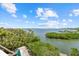 Gorgeous waterfront view with lush tropical greenery at 1364 Point Crisp Rd, Sarasota, FL 34242