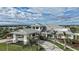 Elegant clubhouse exterior featuring well-manicured landscaping, and a grand entrance at 14953 Contenta Loop, Bradenton, FL 34211