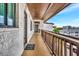 Condo balcony with railing and views of the neighborhood at 1602 Stickney Point Rd # 404, Sarasota, FL 34231