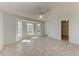 Bedroom featuring a ceiling fan, tile flooring, and a bay window at 1761 Shevlin St, North Port, FL 34286