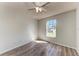 Bright bedroom featuring a ceiling fan, wood-look floors and a window at 1761 Shevlin St, North Port, FL 34286