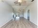 Bright, open living space with sleek floors, leading to an outdoor area through sliding glass doors at 1761 Shevlin St, North Port, FL 34286