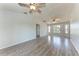 Airy living room with high ceilings, light-colored walls, and large windows offering plenty of natural light at 1761 Shevlin St, North Port, FL 34286