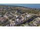 This is an aerial view of a home in a waterfront community with mature trees and views of the Gulf at 1817 91St Nw St, Bradenton, FL 34209