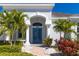 A charming home with a stately covered entry and symmetrical landscaping at 1817 91St Nw St, Bradenton, FL 34209