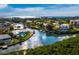 Picturesque aerial shot capturing waterfront homes, docks, and serene views of the Intercoastal at 1900 Harbourside Dr # 102, Longboat Key, FL 34228