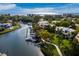 Overhead view displays stunning waterfront homes with private docks, and waterway at 1900 Harbourside Dr # 102, Longboat Key, FL 34228