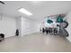 Large garage offering a utility sink and ample storage space for bikes, kayaks, and other recreational equipment at 1900 Harbourside Dr # 102, Longboat Key, FL 34228
