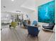 Bright living room boasts modern furniture, sleek flooring, and large windows for natural light at 1900 Harbourside Dr # 102, Longboat Key, FL 34228