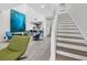 Inviting living room with modern furnishings and an open layout flowing into a bright, contemporary kitchen at 1900 Harbourside Dr # 102, Longboat Key, FL 34228