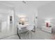 Bright office space featuring tile floors, a modern desk, and ample lighting for a productive workspace at 1900 Harbourside Dr # 102, Longboat Key, FL 34228