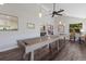 Spacious game room with shuffleboard table and access to the kitchen area at 1932 Baywood Ter, Sarasota, FL 34231