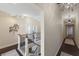 Upper hallway with natural lighting and decorative wall art at 1932 Baywood Ter, Sarasota, FL 34231