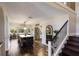 Bright and airy kitchen with a large island, bar seating, stainless steel appliances, and tile floors at 1932 Baywood Ter, Sarasota, FL 34231