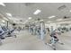 Well-equipped gym featuring modern exercise machines and plenty of space for a full workout at 24068 Canterwood Way, Venice, FL 34293
