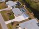 Beautiful canal-front home with an enclosed pool and updated gray shingle roof at 2502 Larkspur Dr, Punta Gorda, FL 33950