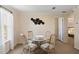 Inviting dining room features a decorative wall art and ample natural light, creating a cozy ambiance at 2502 Larkspur Dr, Punta Gorda, FL 33950