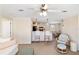 Open-concept living room with breakfast bar and view of the dining area at 2502 Larkspur Dr, Punta Gorda, FL 33950