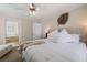 The main bedroom shows the ensuite bathroom and neutral decor at 2502 Larkspur Dr, Punta Gorda, FL 33950
