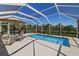 The caged pool area offers privacy and outdoor enjoyment at 2502 Larkspur Dr, Punta Gorda, FL 33950