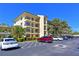 Well-maintained condo building featuring multiple balconies and convenient parking in a landscaped community at 315 30Th W Ave # B214, Bradenton, FL 34205