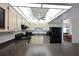 Efficient kitchen with modern appliances, ample counter space, and tiled flooring at 315 30Th W Ave # B214, Bradenton, FL 34205