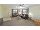 Cozy living room featuring comfortable sofas, neutral decor, and abundant natural light at 315 30Th W Ave # B214, Bradenton, FL 34205