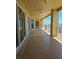 Wide balcony with tile flooring offering ample space and outdoor living at 35 Watergate Dr # 1103, Sarasota, FL 34236