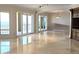 Spacious living room with marble floors, columns and sliding glass doors with ocean views at 35 Watergate Dr # 1103, Sarasota, FL 34236