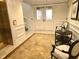 Elegant building lobby with decorative flooring, elevator, and seating area, welcoming residents and guests at 35 Watergate Dr # 1103, Sarasota, FL 34236