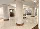 Grand lobby featuring marble floors, decorative pillars, and stylish furnishings, offering a luxurious ambiance at 35 Watergate Dr # 1103, Sarasota, FL 34236