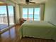 Bright bedroom with a balcony, hardwood floors and ocean views at 35 Watergate Dr # 1103, Sarasota, FL 34236